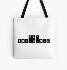 the word bad is spelled in black and white tote bag on a white background