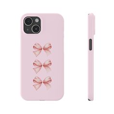 a pink phone case with three bows on the front and back, next to a pen