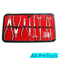 an assortment of surgical instruments in a red case with black trimmings and handles