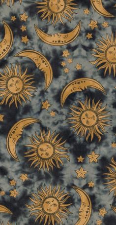 the sun and moon are depicted in this tie - dye pattern, which is blue with gold