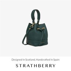 A modern take on the classic bucket bag, our best-selling osette is your perfect everyday companion. Deceptively spacious, the soft structure is handcrafted in spain and features an elegant drawstring closure, complete with our signature music bar. This compact yet versatile silhouette can be carried in hand by the leather top-handle, or styled as a crossbody bag with the detachable leather strap - for elegant ease in your everyday. Luxury Bucket Backpack For Daily Use, Luxury Daily Use Bucket Bag, Luxury Travel Bucket Bag, Luxury Bucket Bag With Detachable Strap For Daily Use, Luxury Shopping Bucket Bag With Adjustable Strap, Luxury Travel Bucket Bag With Detachable Strap, Luxury Bucket Bag Tote With Adjustable Strap, Luxury Bucket Bag With Detachable Strap For Everyday, Luxury Bucket Bag With Leather Handles For Shopping