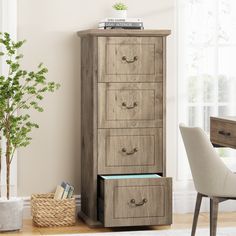 a tall wooden cabinet with drawers next to a chair and potted plant on top