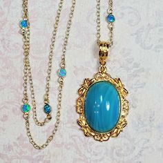 Gold Bohemian Necklaces With Cabochon, Bohemian Gold Cabochon Necklaces, Gold Bohemian Cabochon Necklace, Bohemian Gold Cabochon Necklace, Blue Gemstone Cabochons For Gift, Vintage Blue Cabochon Jewelry, Blue Vintage Cabochon Jewelry, Vintage Oval Gold Cabochons, Blue Oval Cabochon Jewelry