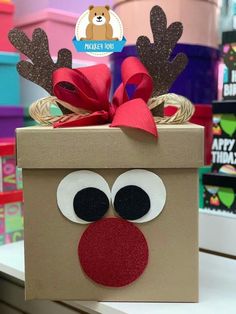 a brown box with red nose and antlers on it