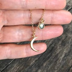 "A bright crescent moon is accented with a tiny bezel set labradorite gem along a delicate 14K gold fill cable chain. Gold vermeil crescent moon measures approximately 5/8\" tall x 1/2\" wide. Faceted moonstone is bezel set in gold vermeil and measures approximately 6mm. Gold fill cable chain is available in several lengths up to 20\" for the perfect custom fit. A dainty necklace that would look great worn alone of layered with other necklaces for a minimalist look. Perfect for everyday wear! Ha Gold Labradorite Jewelry With Moon Charm, Gold Jewelry With Moon Charm And Labradorite, Gold Jewelry With Labradorite Moon Charm, Moon Necklace Gold, Crescent Moon Necklace Gold, Necklace Minimalist Jewelry, Gold Moon Necklace, Crescent Moon Necklace, Labradorite Necklaces