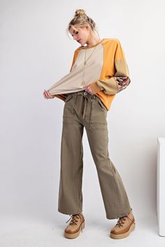 Introducing the Jaycie Tie-Belt Utility Pants, the perfect addition to your wardrobe. These pants feature a front zipper and button closure for a secure fit, while the self-tie belt adds a touch of style. With a straight leg fit and finished hem, these pants are both flattering and versatile. Made from stretch twill fabric, they offer a comfortable and flexible fit. Upgrade your wardrobe with the Jaycie Tie-Belt Utility Pants, available now! Stretch Twill Washed Front Zipper and Button Closure E Utility Pants, Belt Tying, Twill Fabric, Tie Belt, Front Zipper, Straight Leg, Zipper, Wardrobe, Pants