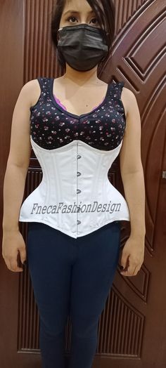 Heavy Duty Steel Boned Underbust Waist Trainer Cotton Three layer Corset 2635 Material Cotton Sizes 3XS~6XL If your required color and size is not listed then please contact with us, All colors and sizes are available. Material: Three layer  Cotton   Outer Shell:100% Cotton Inner Shell:100% Cotton Twill Jeans Features: Heavy Duty, Very Strong Fully Steel Boned Corset For Perfect Hourglass Figure and will Reduce Waist upto 5 inches The Corset can draw in your waist and flatten your tummy It can be used for Tight Lacing, Shaping and waist Training Total 26 Steel Boned 2 Strong Metal Busk Bones 4 Rigid Steel Plates 20 Spiral / Flexible Steel Bones around the corset Fasten at the front with rust free busk set Ties up at the back with strong Lace/Ribbon at waist level 100% Cotton Twill Jeans as White Stretch Underbust Corset, White Stretch Corset With Medium Bust Support, Fitted White Corset, Cotton Corset, Steel Boned Corsets, Waist Trainer Corset, Lace Tights, Corsets And Bustiers, Underbust Corset