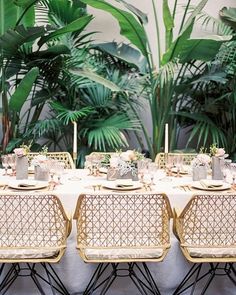 a table set up with place settings for dinner