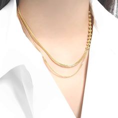 A layered necklace is the perfect way to show off your style. This statement piece adds a touch of glamour and sophistication wherever you go. Detail Item No: JC-Necklace-53Material: S925 SilverColor: Silver/ GoldSize: 41cm* 3mm/5mm/1.7mmWeight: 12.8g