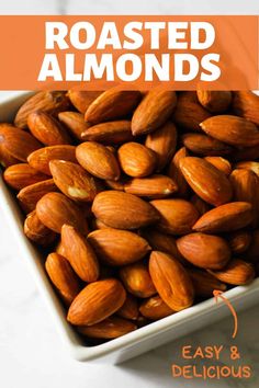 roasted almonds in a white bowl with text overlay reading roasted almonds easy and delicious