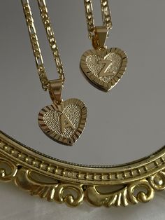 Beautiful heart shaped initial necklace!  * 18k gold plated copper, non tarnish  * 17 inches long (no extension) lays perfectly in the middle of upper chest * perfect for layering * very limited quantity if you want it shorter for a child, please send a message. the chain can be cut! Gold Plated Charm Necklaces With Heart Beads For Gift, Gold Plated Heart Beads Charm Necklace For Gift, Gold Heart Pendant Charm Necklace For Valentine's Day, Gold Double Heart Necklace As Gift For Her, Gold Double Heart Necklace, Gift For Her, Gold Double Heart Necklace Perfect For Gifts, Personalized Gold Plated Heart Cut Necklace, Heart-shaped Tarnish Resistant Necklace For Valentine's Day, Valentine's Day Heart Necklace, Tarnish Resistant