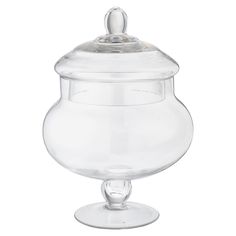 a clear glass jar with a lid on the bottom and a small round bowl below it