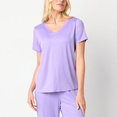 End the day on a chic note with this stylish Ambrielle women's short-sleeve pajama top. Crafted from a super-soft jersey, this pullover top style has a lace-trimmed v-neckline and cap sleeves. Slip it on with your favorite pair of pajama bottoms and a robe. Features: Lace TrimClosure Type: Pullover HeadNeckline: V NeckSleeve Length: Short SleeveSleeve Style: Cap SleeveApparel Length: 25 InchesFiber Content: 95% Polyester, 5% SpandexFabric Description: JerseyCare: Machine Wash, Tumble DryCountry Purple Short Sleeve Sleepwear For Pajama Party, Feminine Short Sleeve Loungewear Sets, Feminine Short Sleeve Sleepwear With Relaxed Fit, Purple Short Sleeve Loungewear Sets, Feminine Relaxed Fit Short Sleeve Sleepwear, Feminine Short Sleeve Sleep Sets, Feminine V-neck Top For Bedtime, Spring Short Sleeve Sleepwear For Relaxation, Purple Sleep Tops For Spring