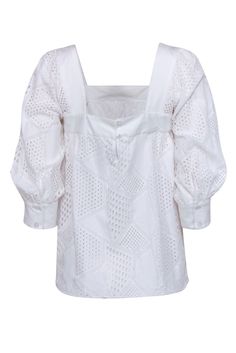 Look simply sweet in this darling blouse from Milly. Crafted from 100% crisp white cotton, this charming top features embroidered eyelet designs in a playful geometric pattern. Style this feminine gem with blue jeans and a brown woven slide for an effortless weekend look! Shell 100% Cotton Combo 75% Cotton, 20% Polyamide, 5% Elastane Lining 100% Cotton Made in USA Square neckline Button keyhole at neck Buttoned cuffs 3/4 length sleeves Bust 33" Waist 42" Shoulder to hem 26" Sleeve length 19.5" Chic Eyelet Blouse For Daywear, Chic Cotton Eyelet Blouse, Chic Cotton Blouse With Eyelet Details, Summer Cotton Eyelet Blouse, Long Sleeve Eyelet Tops For Daywear, Elegant Cotton Eyelet Tops, Cotton Broderie Anglaise Tops For Day Out, Spring Cotton Blouse With Broderie Anglaise, Cotton Blouse With Broderie Anglaise For Spring