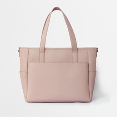 This structured leather tote is the perfect work bag, travel bag, and go anywhere bag. It features a spacious and organized interior for your essentials, a padded compartment for a 15 inch laptop (and 16 inch Macbook Pro), side pockets for your drinks, and you can convert it into a backpack or crossbody. Pink Laptop Bag For Everyday Use, Modern Tote Briefcase For On-the-go, Daily Use Diaper Bag With Luggage Sleeve, Modern On-the-go Briefcase Tote, Modern Briefcase Tote For On-the-go, Versatile Rectangular Diaper Bag For Shopping, Modern Diaper Bag For Travel, Everyday Double Handle Diaper Bag With Luggage Sleeve, Everyday Diaper Bag With Luggage Sleeve And Double Handle