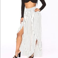 Maia Stripe Pants From Fashion Nova. Trendy White Wide Leg Pants For Vacation, Trendy White Beach Pants, White Wide Leg Bottoms For Day Out, White Wide Leg Pants For Summer Night Out, White High Waist Wide Leg Pants For Night Out, White Wide Leg Pants For Night Out, Trendy White High-waisted Pants, Trendy High-waisted White Pants, White Trousers For Day Out