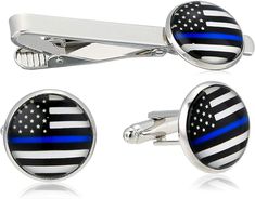 Silver colored metal plated thin blue line tie bar and cufflinks set Makes the perfect gift for anyone in law enforcement Back the Blue! Show your support with these fine pieces of jewelry Wonderful addition to that someone special's clothing accessory collection Set includes 2 cufflinks and 1 tie bar clip American Flag Tie, Tie Bar Clip, Cufflink Set, Tie Bar, Tie Accessories, Blue Line, Luxury Clothing, Suit And Tie, Luxury Outfits