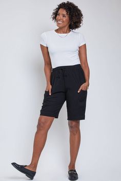 Our Women's Elastic Waist Bermuda With Patch Pockets. Go chic or casual, you can do it all with these ultra-versatile bermudas. Featuring drawstring waistband, big patch pockets, and cuffed hem. Inseam: 11” Rise (To top edge of band): 13” Leg Opening: 22” Composition - 100% Rayon Dry clean only. Drawstring Waistband, Egift Card, Patch Pocket, Elastic Waist, Elastic, Blue, Black