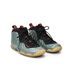 Nike 'Air Foamposite One Gone Fishing' Sneakers in turquoise and grey snakeskin rubber with a black mesh trim and a beige sole. Features a black lace-up closure with a white fish bone embroidered logo on the heel. Brand = Nike Condition = 8/10, very good Size = 38.5 Material = Rubber/Mesh SKU = 19574-61 White Fish, Foam Posites, Gone Fishing, Nike Kids, Fish Bone, Black Mesh, Black Lace, Nike Air, Fishing