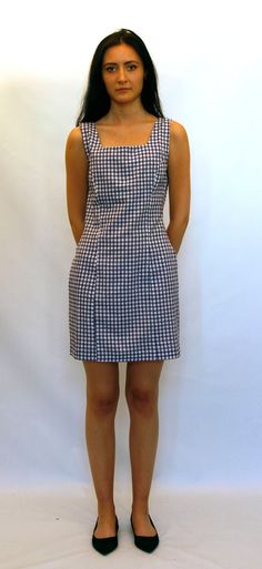 Handmade 1960's style, fully lined, dress in cotton and poly-cotton. Made to order from an original 1960's dress pattern, updated to combine contemporary fitting with a retro style. The dress has a back zip and can be made in a variety of colours including plain and gingham; pink, black, white, red, blue yellow, green, and purple  The dress has a square neck and is semi-fitted for a flattering shape fully lined                               Bust      WaistHips  Size XS UK8  32"  24"         35" Retro Plaid Dress For Work, Retro Gingham Mini Dress, Retro Fitted Knee-length Plaid Dress, Fitted Retro Knee-length Plaid Dress, Fitted Knee-length Retro Plaid Dress, Fitted Gingham Knee-length Mini Dress, Retro Fitted Plaid Mini Dress, Retro Fitted Mini Plaid Dress, Retro Fitted Mini Length Plaid Dress