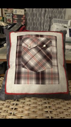 a pillow with a plaid pattern on it