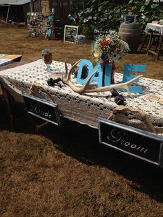 the table is decorated with antlers and signs