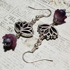 New Handmade Earrings Featuring Silver Plated Lotus Charms, Purple Glass Flowers And Gorgeous Round Marbled Stone Beads. Bundle With Other Items From My Closet To Save With Combined Shipping! New To Poshmark? Use Referral Code Sharerw04 When You Sign Up To Receive Poshmark's Current Signup Offer (Typically $5-$10 Poshmark Credit!) Cheap Czech Glass Dangle Jewelry, Purple Czech Glass Dangle Earrings, Handmade Vintage Purple Flower Earrings, Whimsical Purple Nickel-free Earrings, Cheap Purple Flower-shaped Earrings, Purple Flower-shaped Earrings, Movie Ideas, Mickey Mouse Earrings, Lotus Earrings