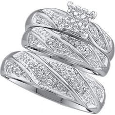 two white gold wedding rings with diamonds