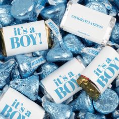 it's a boy candy bar wrappers on top of blue foil wrapped candies