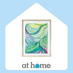 the logo for at home with an abstract painting in it's center and blue background