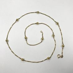 "PLEASE READ ENTIRE DESCRIPTION BEFORE PURCHASING For Sale: (1) Stunning 18k Yellow Gold Box Chain Necklace with Gold Beads Please see pictures for more details! Features: Beautiful 18k yellow gold necklace with gold beads. The clasp is stamped 750. The rest of the gold has been tested to 18k gold. This is a stunning piece!! In great condition. May be small surface scratches from normal wear. (AS SEEN IN PICTURES) Specifics: Necklace approx. 22\" long Total weight 9.6 grams --------------------- Yellow Gold Necklace With Box Chain And Round Beads, Yellow Gold Box Chain Necklace With Beads, Gold Box Chain Necklace With Round Beads, Gold Necklace With Box Chain And Round Beads, Yellow Gold Beaded Chain Necklace, Yellow Gold Beaded Necklaces For Formal Occasions, Formal Yellow Gold Beaded Necklaces, Gold Necklace With Beaded Chain In Fine Jewelry Style, Formal Jewelry With Round Beads Chain