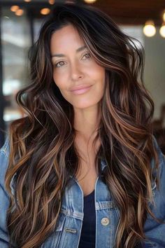 Long brunette hair with sun kissed balayage highlights and voluminous waves Sunkissed Hair Brunette Dark, Dark Summer Hair, Icy Blondes, Sunkissed Brunette, Best Long Haircuts, Long Haircuts, Brunette Hair With Highlights, Subtle Highlights, Fabulous Hair