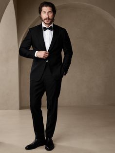 Timeless tailoring, this exquisite black tuxedo jacket offers elevated style to last a lifetime.  Made from Italian virgin wool, our designers employed a classic Barathea weave, a sharp roped shoulder construction and our tailored slim fit for a natu Black Tuxedo Jacket, Black Tuxedo, Tuxedo Jacket, Suit Separates, Wedding Inspiration Board, Tall Guys, Luxury Fabrics, Wedding Outfit, Mens Suits