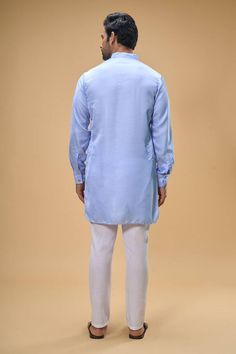 Sky blue sleeveless bundi crafted in dupion silk with sequin floret quad embroidery. Paired with a solid ice blue kurta and a white pant. - Aza Fashions White Pant, Blue Kurta, Dupion Silk, Nehru Jackets, Silk Embroidery, Kurta Set, Pants Pattern, White Pants, Ice Blue