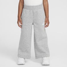 Put your kiddo in classic sport style with these pants, made of soft cotton/poly fleece. The stretch waistband provides a comfy fit, pockets on the sides are handy and the wide legs create a relaxed feel. Pair with the Nike Sportswear Club Fleece Boxy Graphic Pullover Hoodie for a coordinated look. Nike Sportswear Club Fleece, Graphic Pullover, Sport Style, Wide Legs, Comfy Fits, Nike Sportswear, Sport Fashion, Leg Pants, Toddler Girl