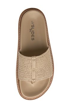 A cushioned footbed brings everyday comfort to a versatile sandal topped with a woven strap. 1" heel Cushioned footbed with arch support Memory foam cushioning Synthetic upper/leather lining/synthetic sole Imported Beach Footbed Sandals With Textured Footbed, Beige Sandals With Arch Support For Vacation, Synthetic Footbed Sandals With Single Toe Strap For Vacation, Synthetic Single Toe Strap Footbed Sandals For Vacation, Synthetic Single Toe Strap Vacation Footbed Sandals, Comfortable Open Toe Flip Flops With Woven Sole, Beige Beach Slippers With Cushioned Footbed, Synthetic Slides With Single Toe Strap For Beach, Comfortable Sandals With Textured Sole For Vacation