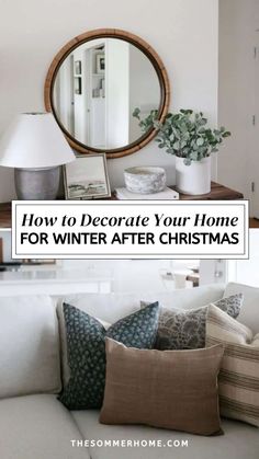 a living room with white couches and pillows on top of it, the words how to decorate your home for winter after christmas