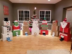 a room filled with boxes and christmas decorations