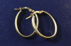 -Vintage 14k Gold Italy Oval Shape Hoop Earring -Inside diameter: 0.75 in x 0.55 in -Earring thickness: 3 mm x 1.8 mm -Total weight: 1.2 g -Marked 14k, Italy Classic Oval Hoop Earrings As Gift, Formal 14k Gold Oval Hoop Earrings, Oval Yellow Gold Hoop Earrings Stamped 14k, Oval 14k Stamped Yellow Gold Hoop Earrings, Classic Oval Link Earrings For Formal Occasions, Oval 14k Gold Hoop Earrings For Anniversary, Gift 14k Stamped Oval Hoop Earrings, Persian Turquoise, Perfect Stocking Stuffers