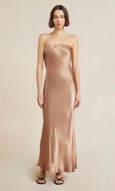 THE DREAMER ASYM DRESS - GOLDEN – BEC + BRIDGE US Strapless Wedding Dresses With Side Slits, Elegant Gold Evening Dress With Asymmetrical Neckline, Gold One-shoulder Maxi Dress, One-shoulder Satin Maxi Dress For Dinner, One Shoulder Silk Maxi Dress For Dinner, Silk One-shoulder Maxi Dress For Dinner, Strapless Evening Dress With Side Slits, Elegant Gold Dress With Asymmetrical Neckline, Elegant Gold One-shoulder Dress For Gala