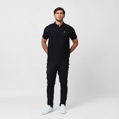 Our versatile classic polos are made with 100% Pima cotton. They are perfect as an office attire or leisurewear providing you a sophisticated look. Made in Peru100% Pima CottonGold Embroidered James Bark LogoRibbed Finishes Elegant Cotton Polo Shirt For Business Casual, Black Short Sleeve Polo Shirt For Work, Black Cotton Polo Shirt For Business Casual, Black Cotton Polo Shirt For Work, Classic Cotton Polo Shirt For Business Casual, Classic Black Polo Shirt For Work, Classic Fitted Polo Shirt For Workwear, Classic Relaxed Fit Polo Shirt For Work, Fitted Cotton Polo Shirt For Business