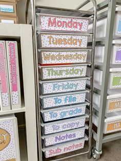 a metal rack filled with lots of greeting cards