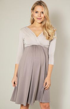 Colour blocking in neutral tones - the ultimate in refined dressing. Our ever-popular Willow Maternity Dress is now available in Almond Truffle. This superbly versatile design is your go-to staple for stylish day wear as well as evening chic. You will love the flattering cross-over neckline with clever gathers along its neckline, the soft stretch empire waist and 3/4 sleeves. Enjoy throughout your pregnancy and after for nursing. Neutral colour block tones Premium soft stretch jersey Empire wais Elegant Fitted V-neck Maternity Dress, Elegant Maternity Dress In Cream, Elegant Cream Maternity Dress, Taupe Fitted V-neck Dress, Elegant Maternity Dresses With Surplice Neckline, Elegant Ruched Maternity Dress For Spring, Elegant Gray Ruched Dress, Elegant Beige Maternity Dress For Spring, Fitted Taupe V-neck Dress