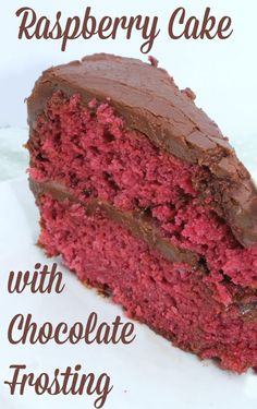 a slice of raspberry cake with chocolate frosting