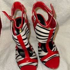 Alba 6” Animal Print Platform Heels. Size 8.5. White & Black Print Out Lined With Red. Black In Side If Shoe And Heel. Side Red Zipper And Red Strap. Item#861 High Heel Zebra Print Party Heels, Black High Heels With Zebra Print, Spring Zebra Print High Heels, Spring Zebra Print Heels, Bling Heels, Red Stilettos, Rhinestone Shoes, Rhinestone Heels, Stiletto Boots