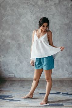 Perfect for the summer, this breathable, free-flowing linen cami is the ideal wardrobe staple for the warm months and long evenings. This strapless white blouse is modestly lined in the chest with a loose, flowy hem. Perfect to wear for a picnic in the park or on a cocktail date with your girls!Made from washed linen, this strappy top is not only durable but gets softer after every wash! ***The Prancing Hare is the sister brand of Bunny Street, which was launched by Irene Sheyko in 2013. Drawing White Linen Cami Tank Top, Sleeveless Linen Camisole For Vacation, White Linen Sleeveless Camisole, Beach Linen Tank Camisole, Linen Tank Camisole For Beach, Sleeveless Linen Camisole For Beach, Beach Tank Linen Camisole, Spring Linen Summer Camisole, Sleeveless Linen Camisole For Summer