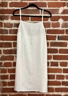 White Linen Dress With Tie Back, White Unlined Linen Dress, Unlined White Linen Dress, White Sleeveless Linen Dress With Tie Back, White Linen Dress With Straight Neckline For Summer, Unlined Linen Dress With Spaghetti Straps, Summer White Linen Dress With Square Neck, White Linen Summer Dress With Square Neck, White Linen Square Neck Dress For Summer