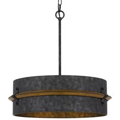 a chandelier hanging from the ceiling with an iron frame and wood trim around it