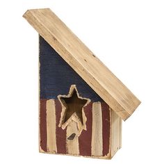 a wooden birdhouse with an american flag painted on it's side and a star in the roof