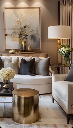 a living room filled with lots of furniture and flowers on top of a coffee table